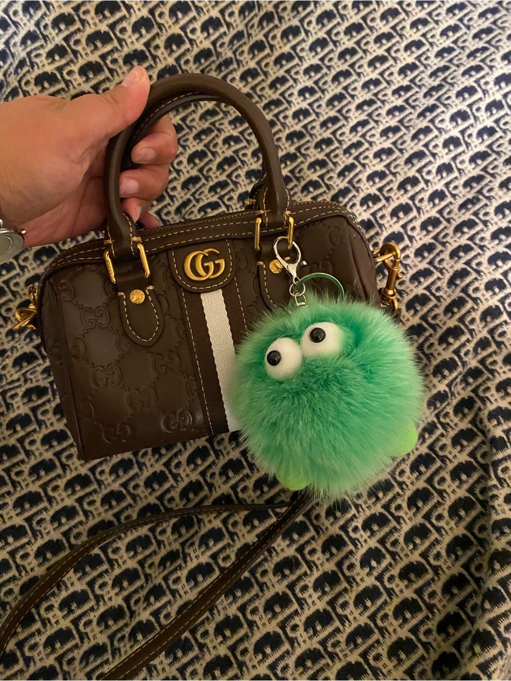 Brown Mini Top-Handle Bag with Green Pom Charm
